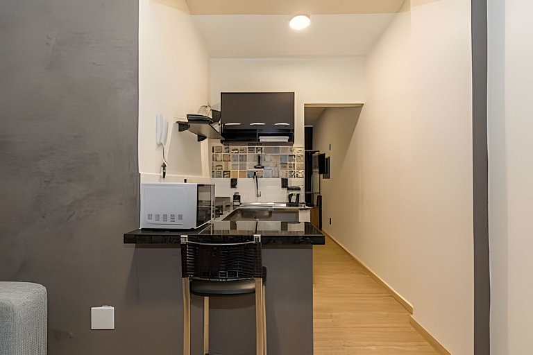 Studio bem localizado com vista livre e a/c