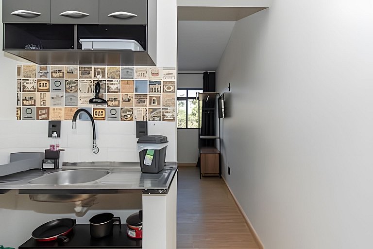 Studio bem localizado com vista livre e a/c