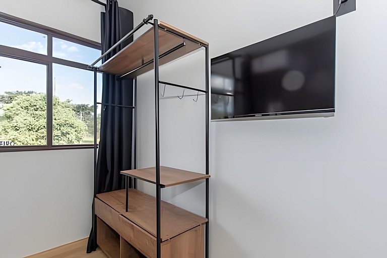 Studio bem localizado com vista livre e a/c